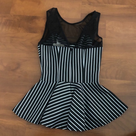 Arden B. Peplum top. - Picture 2 of 3